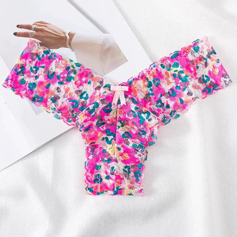 Women’s pink floral lace thong underwear with ruffles and white bow by Simples Market