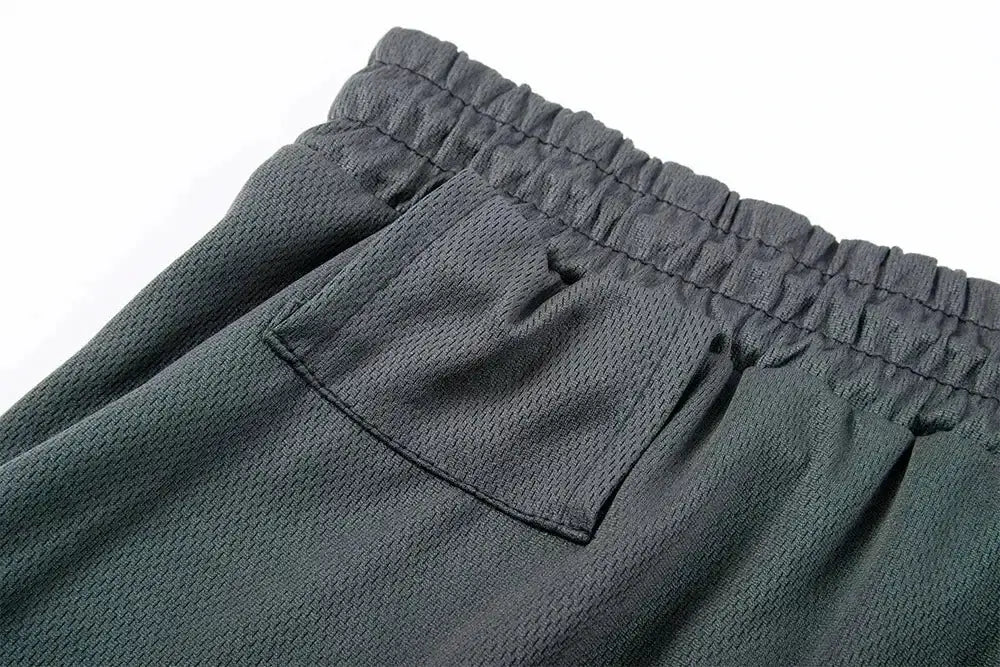 Simples Market men's gray sports shorts with elastic waist and back pocket; quick-dry breathable fabric