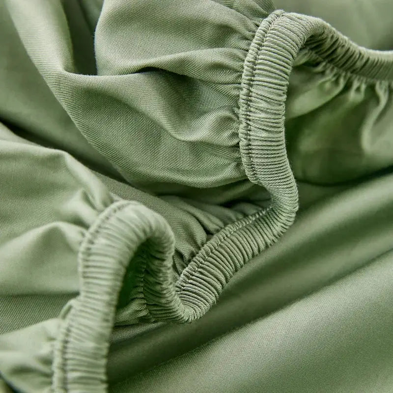 Egyptian cotton bed fitted sheet by Simples Market in olive green with elastic edge