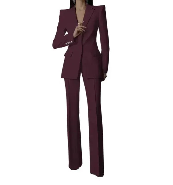Women's burgundy two-piece pantsuit with long-sleeve blazer and wide-leg pants for party wear