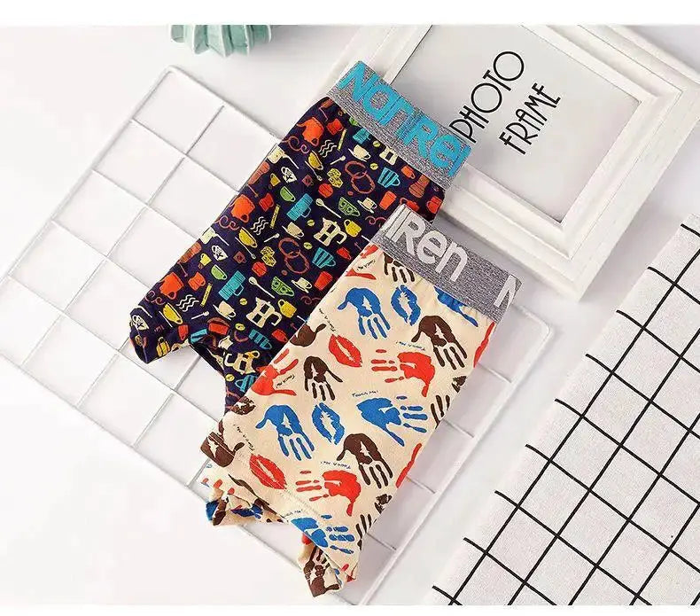 4-pair men's cotton boxer shorts set in assorted prints: navy with colorful icons and beige with multicolor handprints