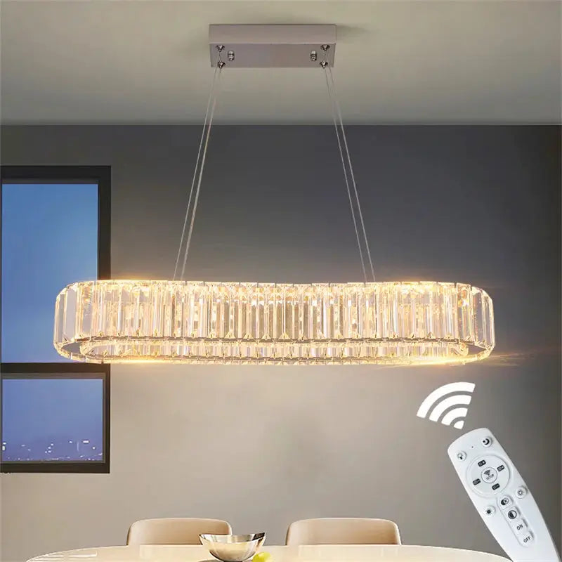 Modern crystal ring LED chandelier pendant light, chrome lustre finish, remote dimming.