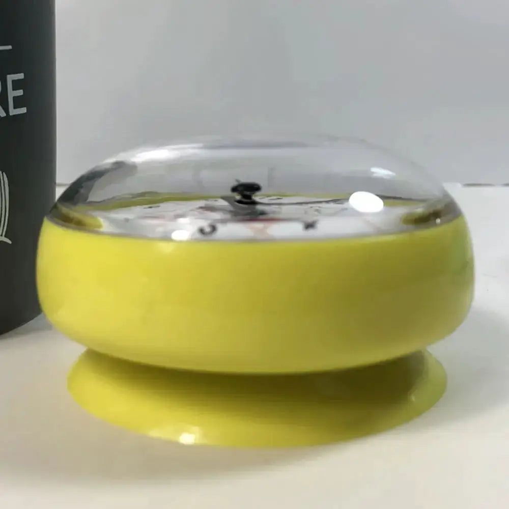 Mini Sucker Wall Clock by Simples Market, yellow base with clear dome, 7 cm quartz clock