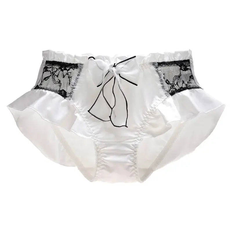 Women’s white satin panties with black lace panels, ruffle trim, and a front bow
