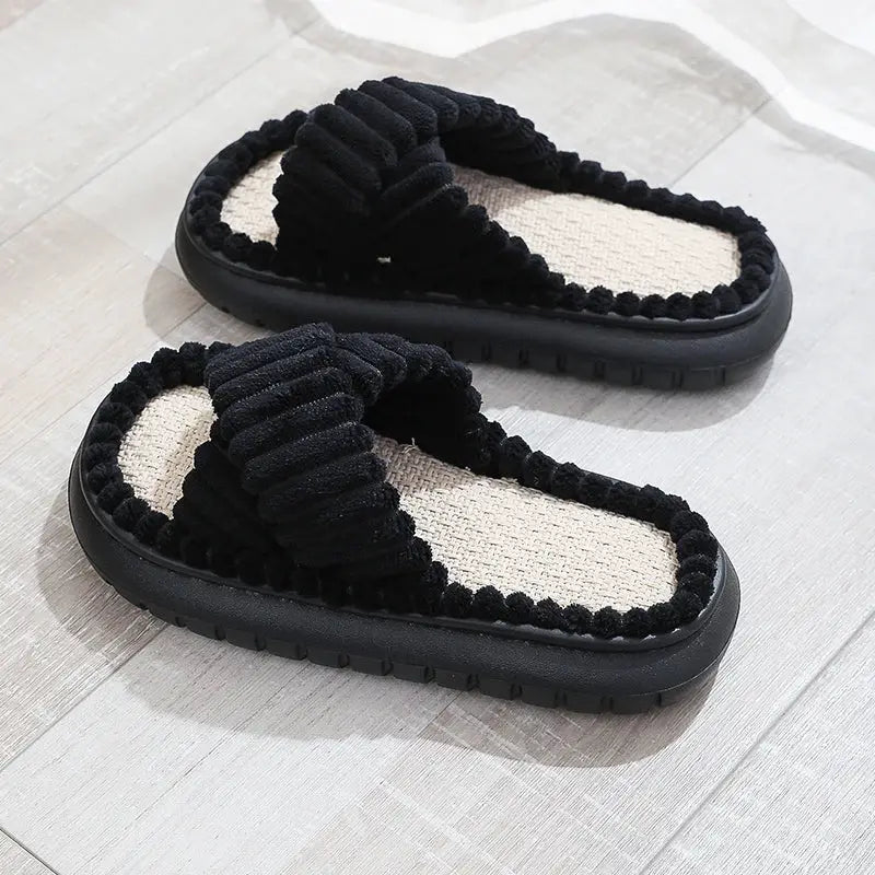 Pair of black women's open-toe cross-band linen-soled indoor slippers with non-slip outsole
