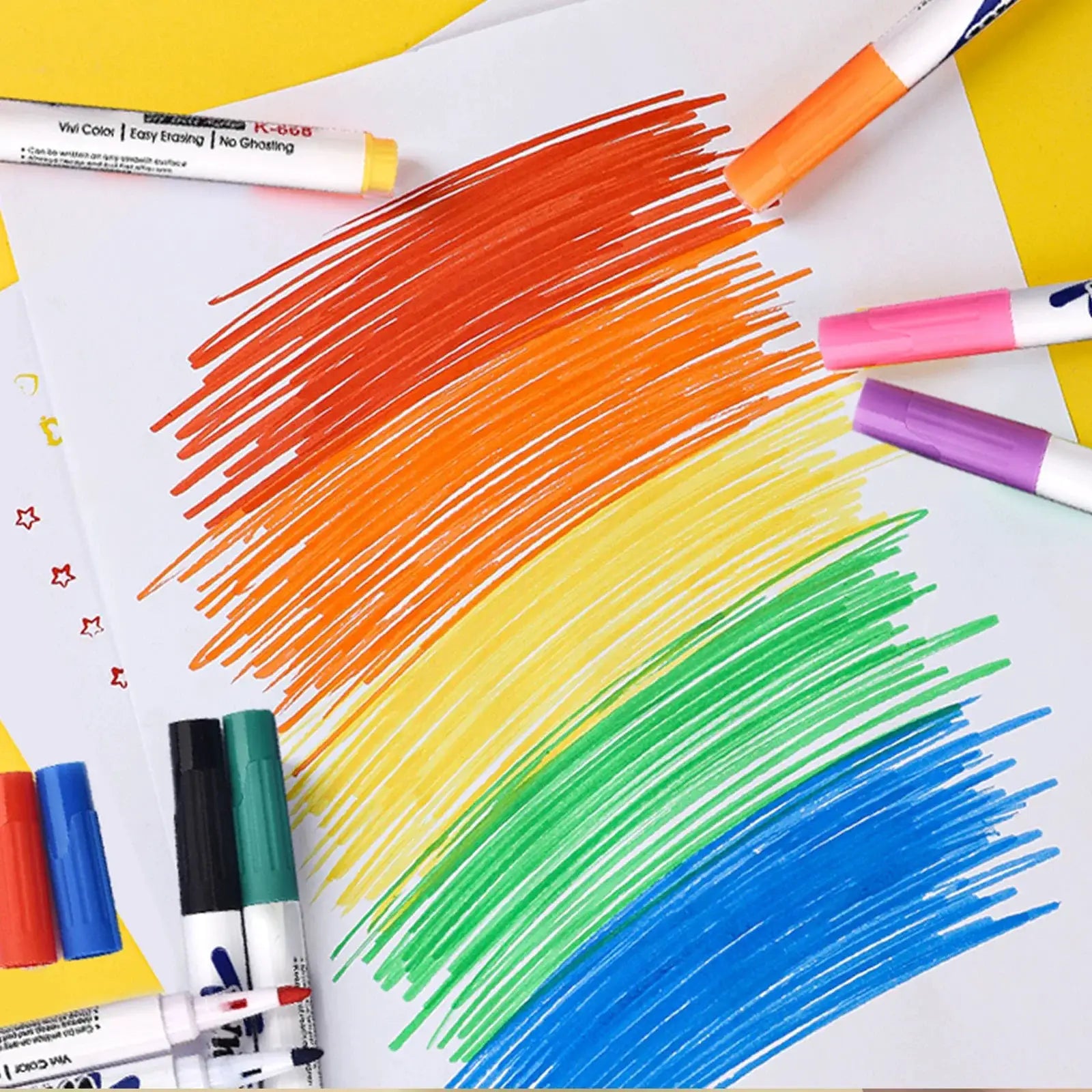Simples Market water painting pen set with assorted color markers creating rainbow doodles on white paper