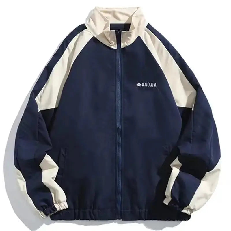 Varsity-style windbreaker jacket in navy with cream color-block panels, zip front