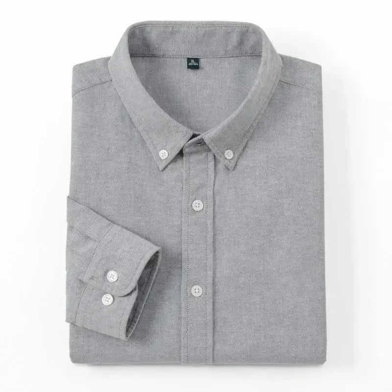 Men's Slim-Fit Oxford Cotton Shirt in gray, long-sleeve, folded neatly with button-down collar, casual elegance.