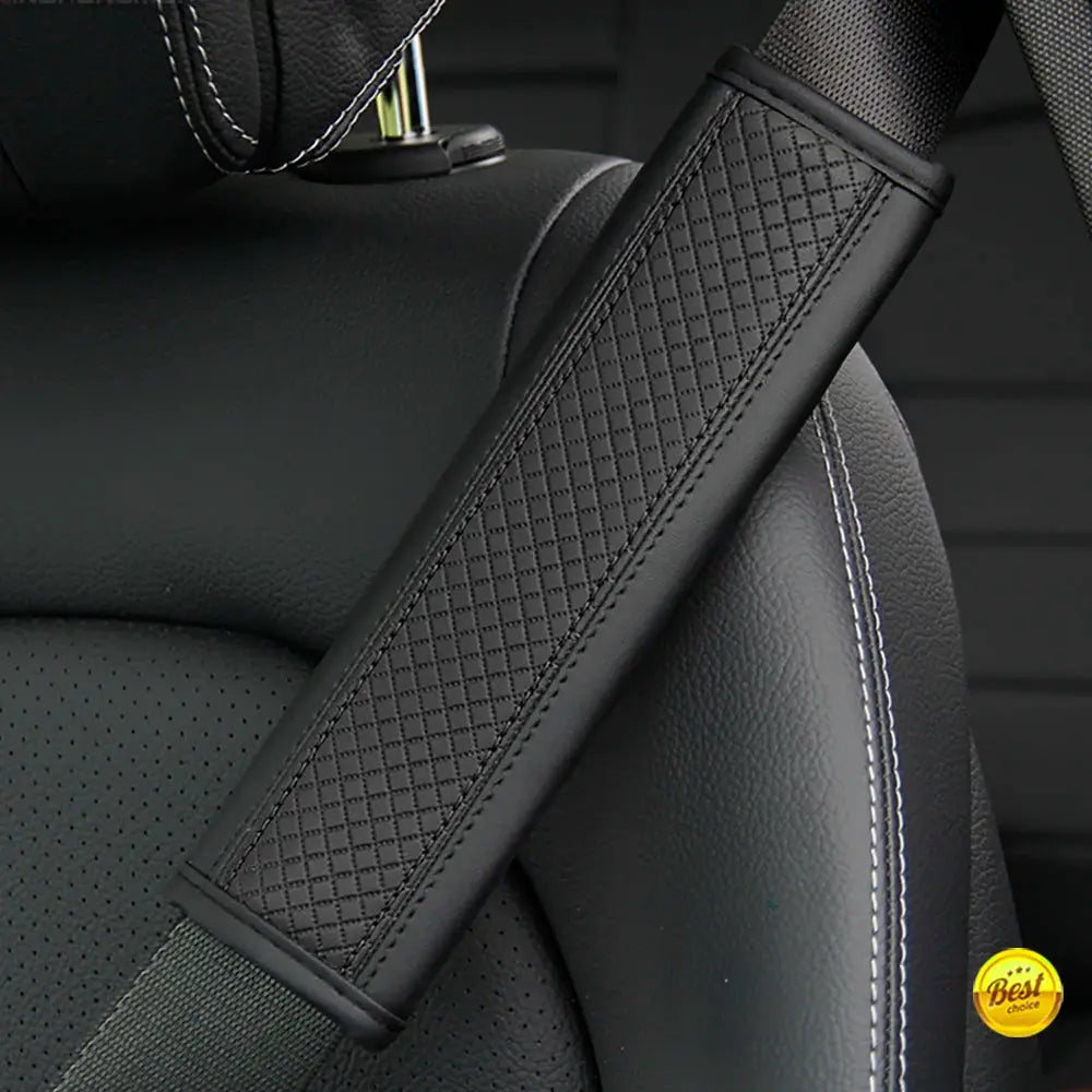 Car seat belt shoulder cover in black PU leather with embossed diamond pattern for comfort and protection