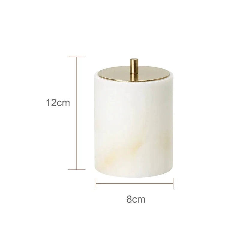 Soap dispenser in white onyx marble with gold pump by Simples Market, 12cm tall and 8cm diameter.