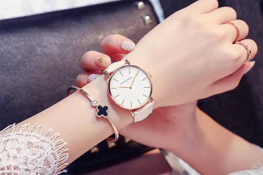 HANNAH MARTIN women's watch with rose-gold case and white leather strap; minimalist 36mm dial