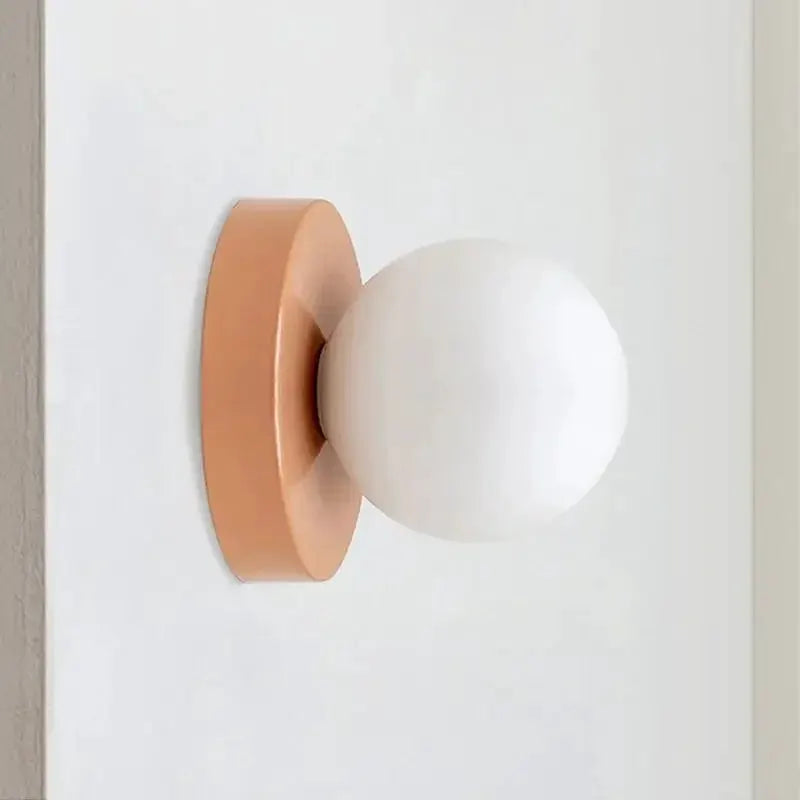 Nordic Macaron LED wall lamp with copper backplate and white glass globe