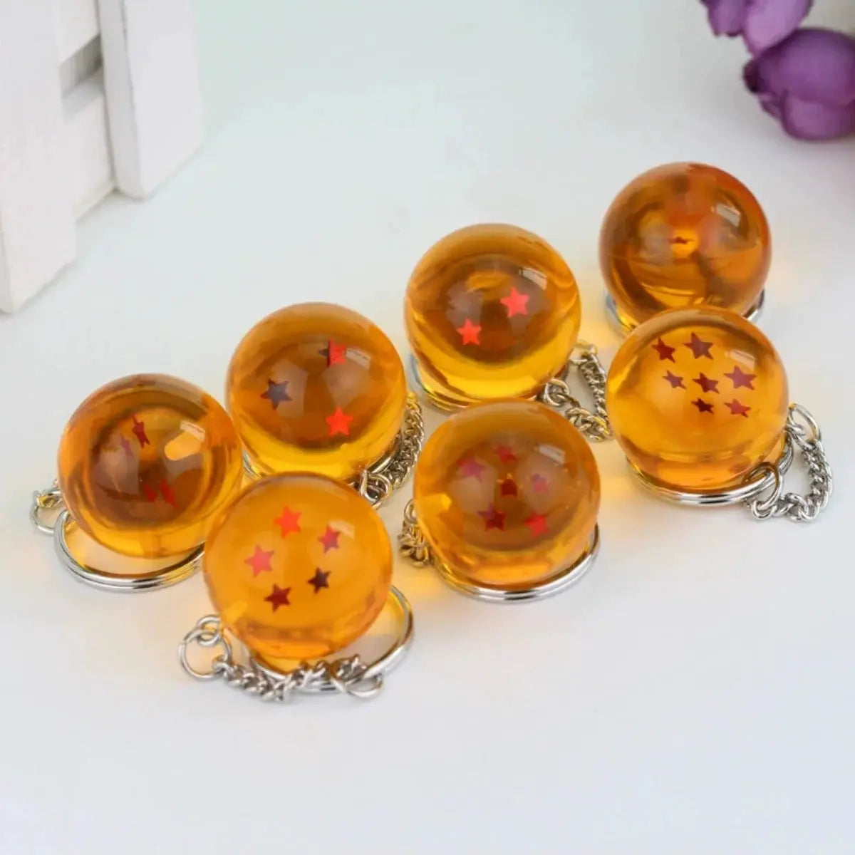 Dragon Ball bead keychains set of seven orange glass spheres with red star inserts and silver rings