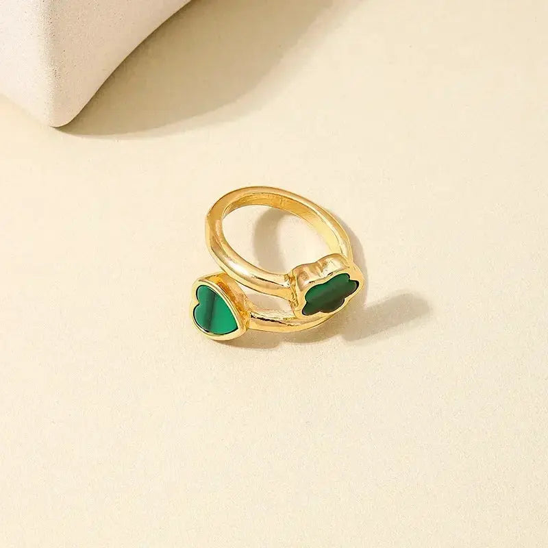 Exaggeration Punk metal ring set for women, gold-tone with green enamel clover accents, adjustable