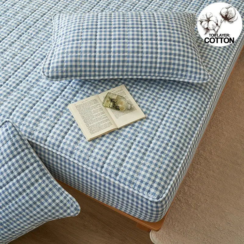 Quilted plaid mattress cover set in blue gingham with 2 matching pillows