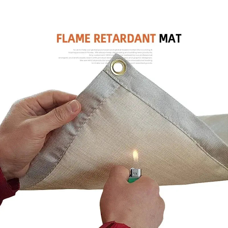 Flame retardant fiberglass insulation mat in silver with a metal grommet