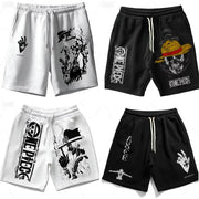 Two ONE PIECE animation printed shorts: white pair with bold artwork and black pair with skull design.
