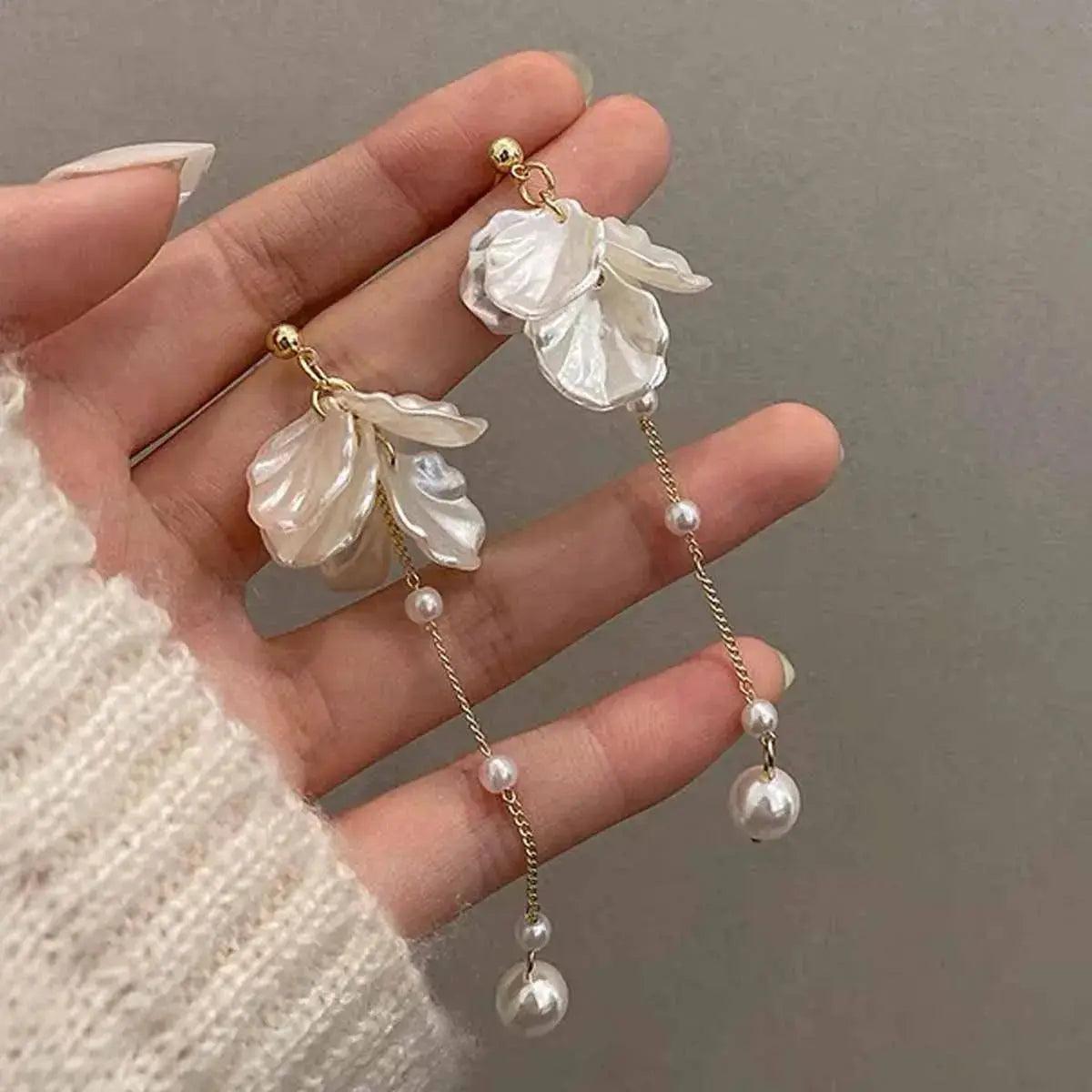 Fashion Unique Glossy Shell Flower Pendant Earrings pair by Simples Market, white petals with pearl drops on gold chain