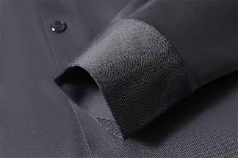 Men's black wrinkle-resistant long-sleeve shirt with cuff detail