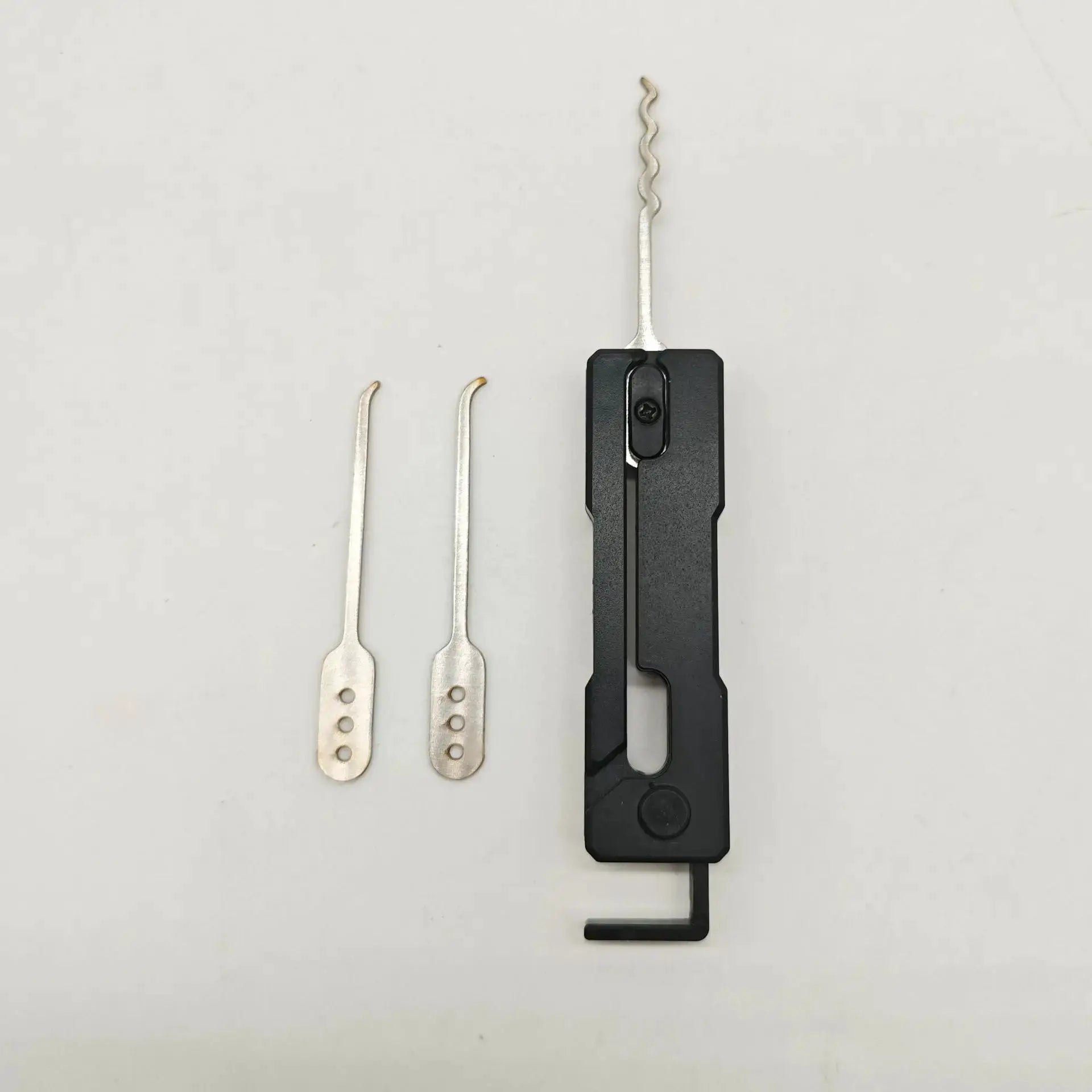 Grav Pick multi-tool set with stainless steel lock picks and a black quick-flip handle