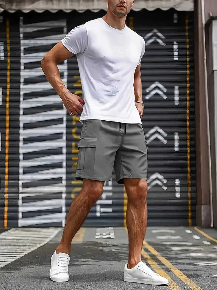 Men's cargo shorts in gray with large side pockets, loose fit for casual workwear