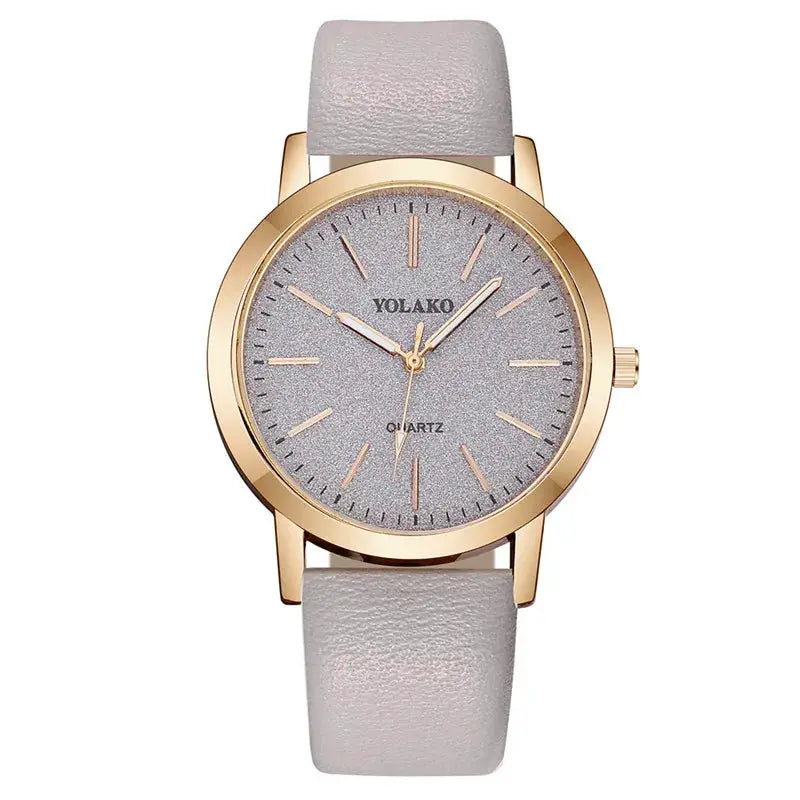 Women's quartz wristwatch with gold-tone case, gray glitter dial and gray leather strap, YOLAKO