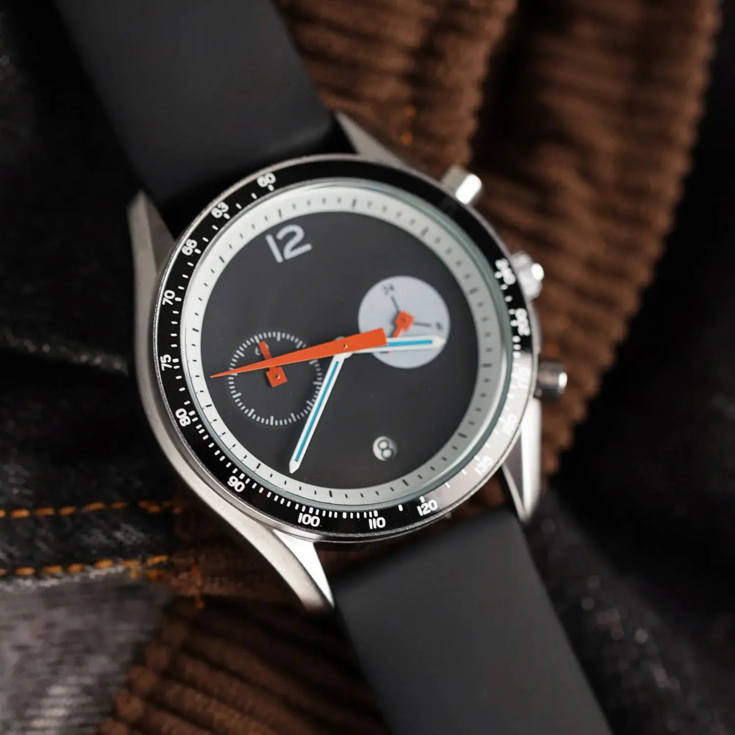 CILOA men's luxury watch by Simples Market; black dial, orange hands, tachymeter bezel
