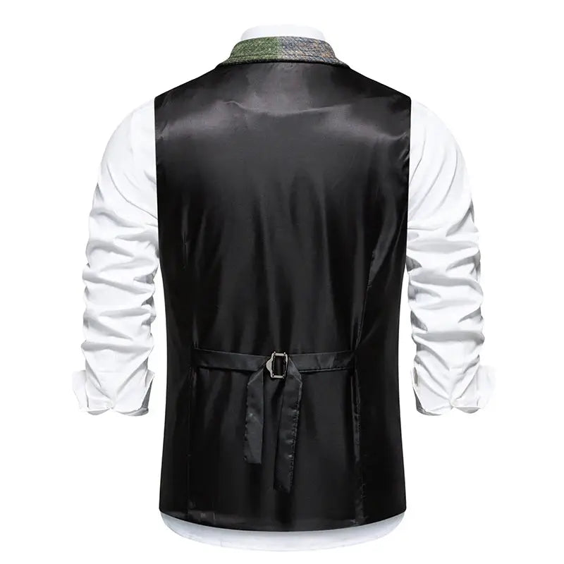 Men's green tweed plaid waistcoat back view with black satin body and adjustable belt, worn over white shirt.