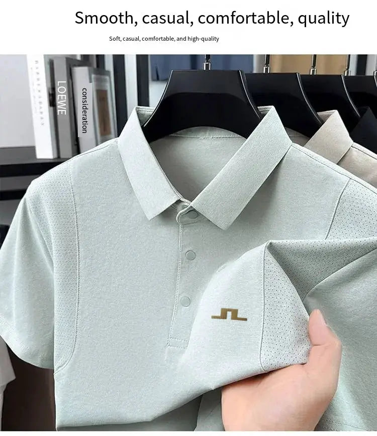 Men's polo shirt trio in light gray with polo collar, vented sides, button placket and chest logo on hangers