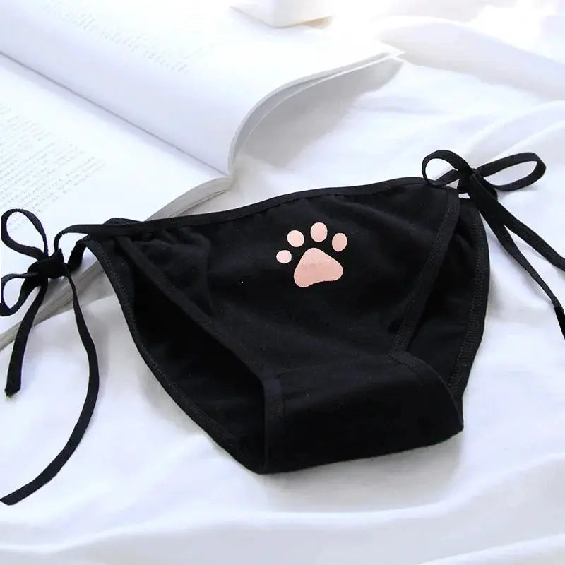 Women's black cotton panties with pink paw print, side-tie design
