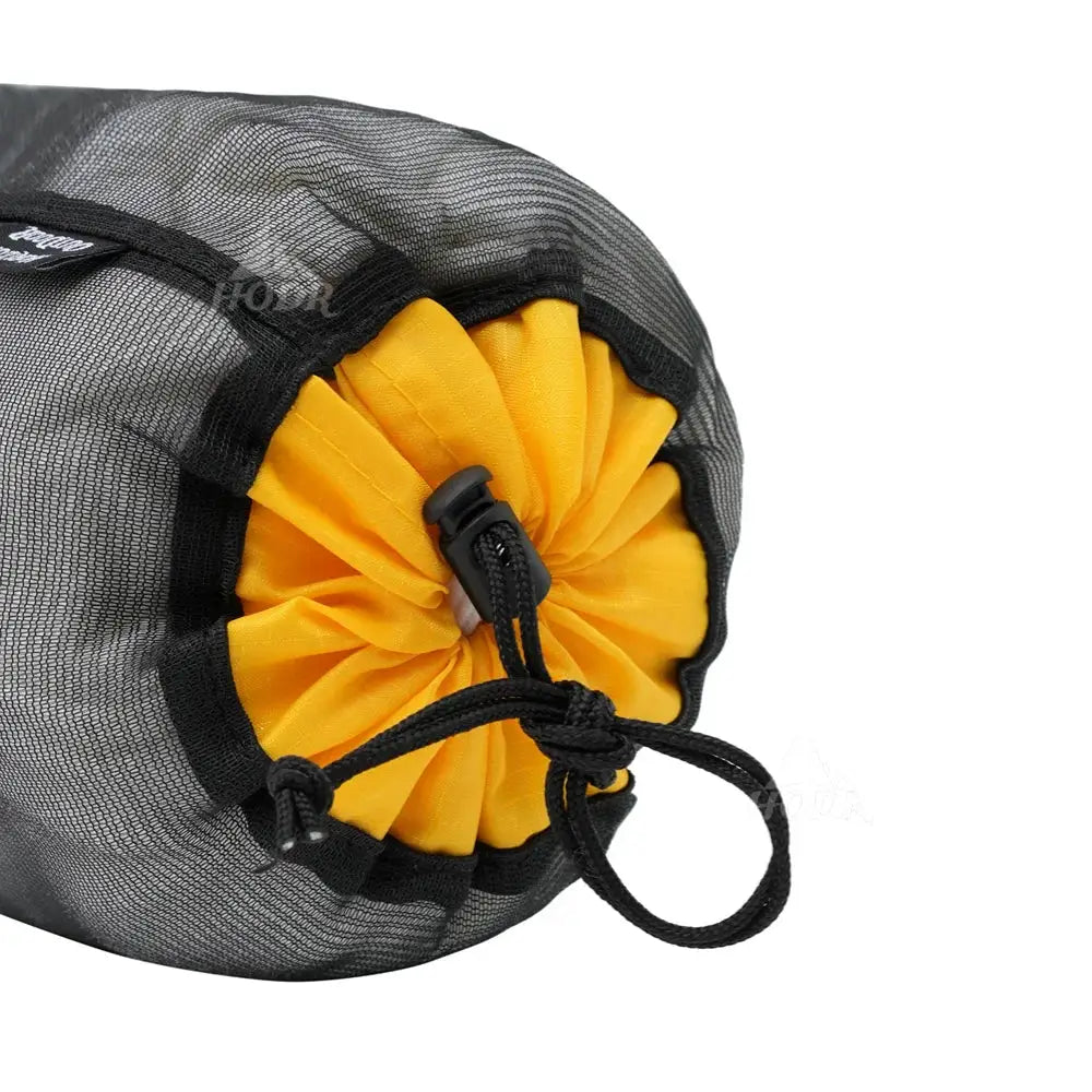 HODR mesh stuff sack by Simples Market, lightweight gray mesh with yellow drawstring closure