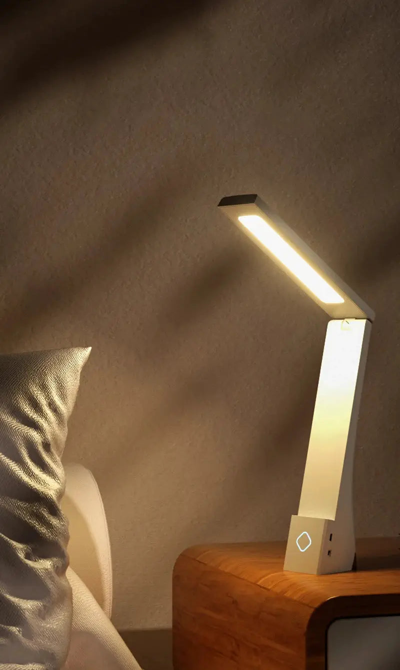 Simples Market white LED desk lamp, foldable with warm white light for bedside or desk use