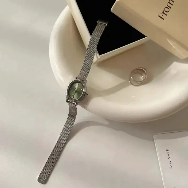 LuxeWear Small Oval Green Dial Stainless Steel Quartz Watch For Women Elegant Everyday Timepiece