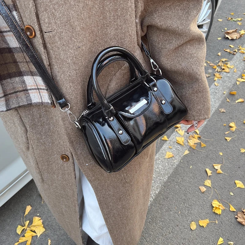 Mini top-handle bag in black patent PU leather with detachable shoulder strap