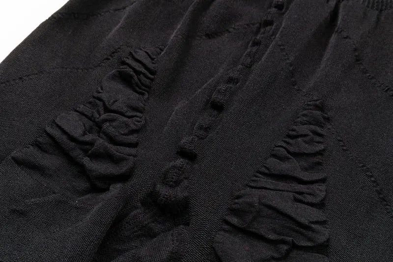 Men's black tummy-control shapewear shorts with ruched detailing