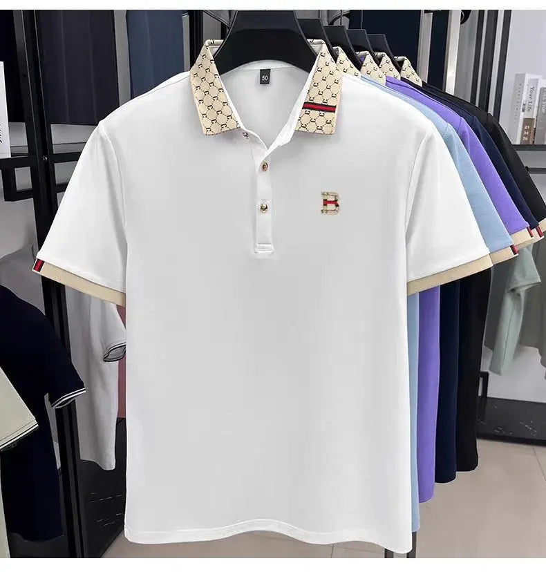 Polo shirt Simples Market, white short-sleeve with beige patterned collar and small embroidered B logo.