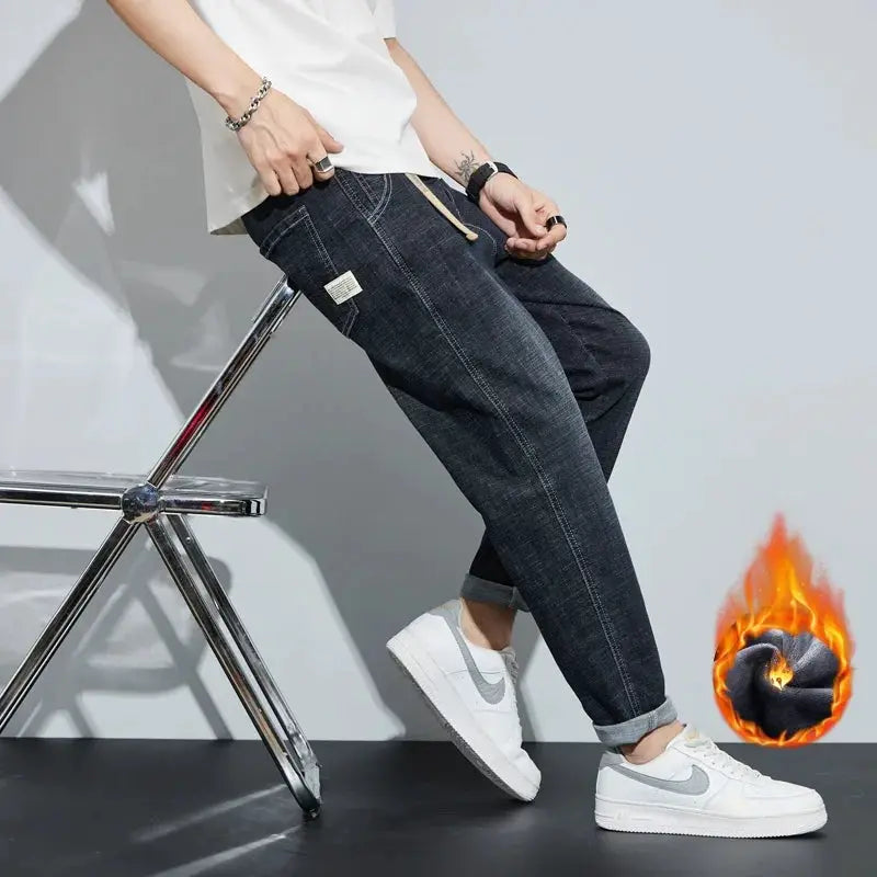 Men's dark blue fleece-lined jeans, loose straight fit with rolled cuffs