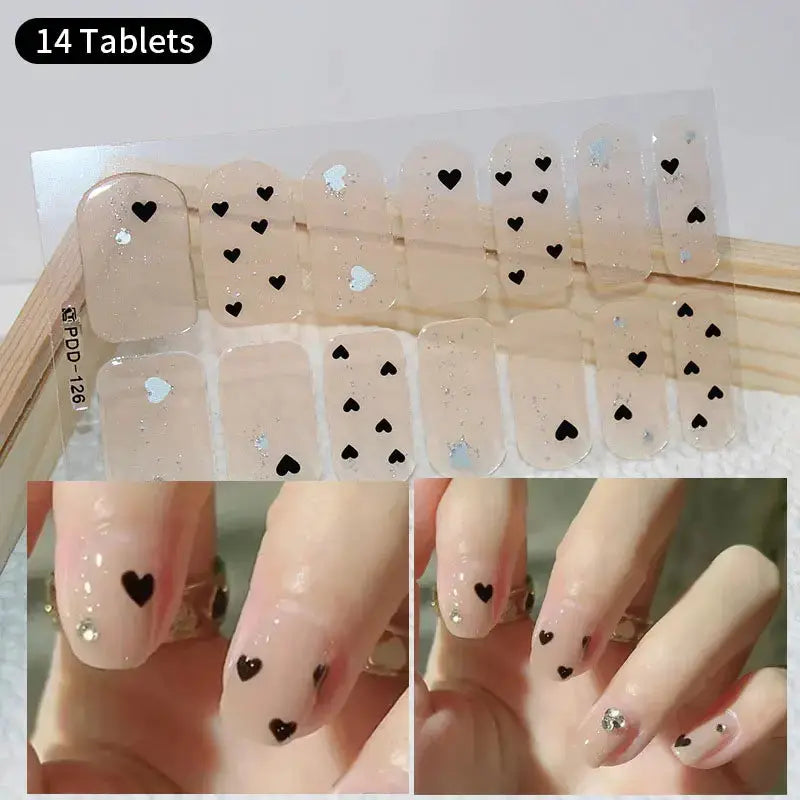 Simples Market full-cover nail stickers on nude-pink sheet with black heart decals and glitter (14-piece)