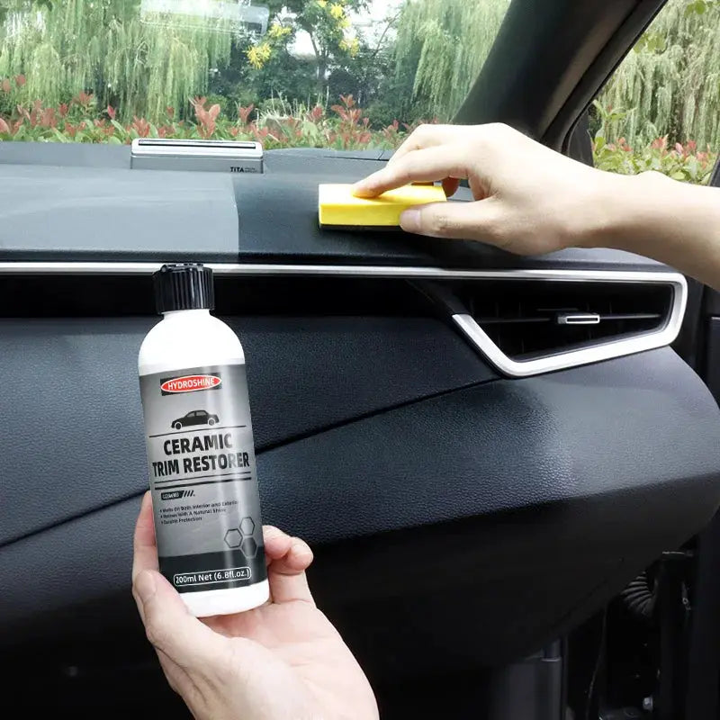 Hydroshine Ceramic Trim Restorer bottle with black cap used on car dashboard plastic trim.