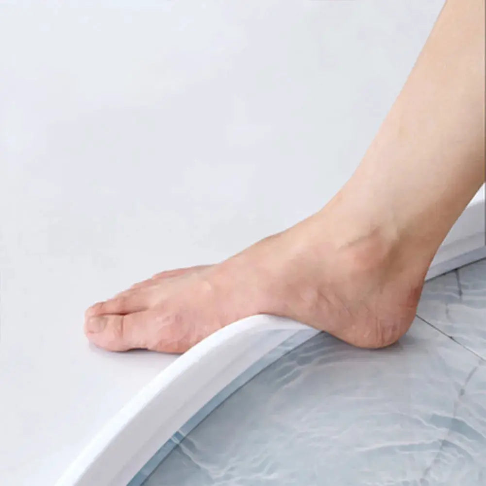1-3M white silicone shower dam along tub edge for dry and wet separation