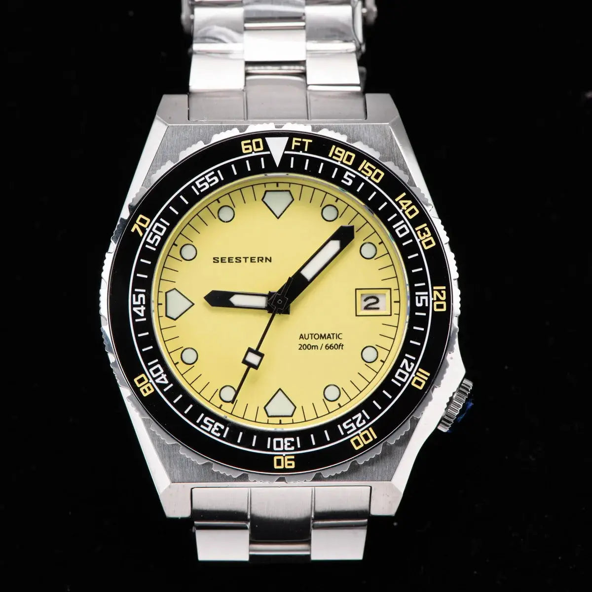 Seestern Sub600T V3 men's automatic diver watch with yellow dial, black bezel, stainless steel bracelet.