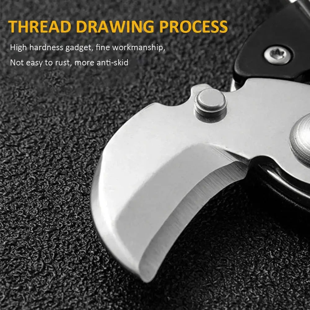Multifunctional keychain tool with hexagon folding coin knife, silver blade, black handle