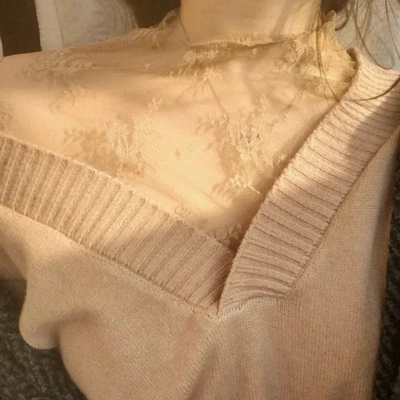 Beige lace mesh blouse with sheer long sleeves, shown layered over a knit sweater