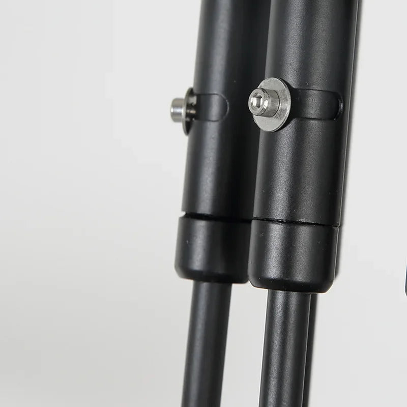 Mouille ceiling spider pendant light in black metal with adjustable joint clamps.