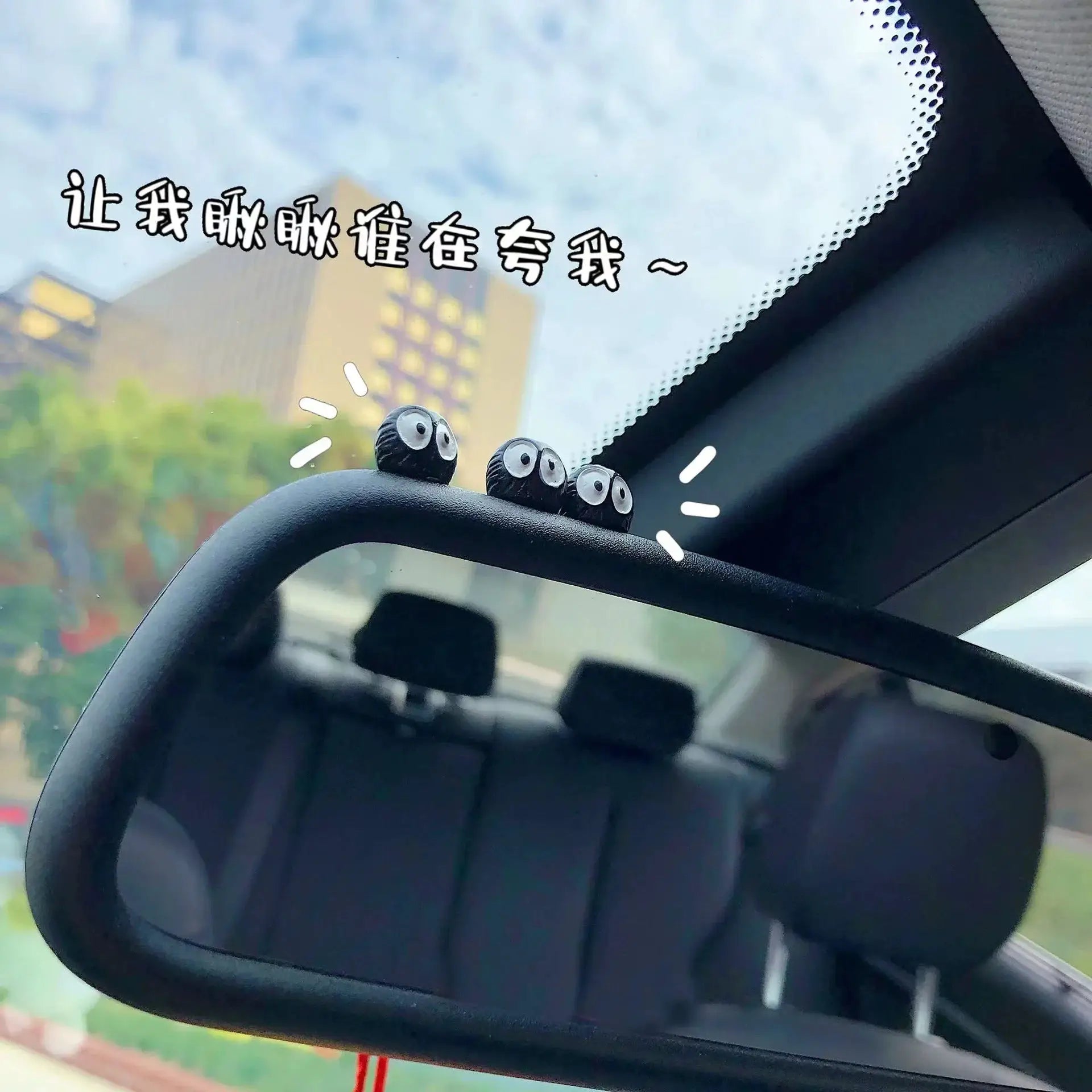 Five black elf car interior decorations perched on steering wheel for cute dashboard decor