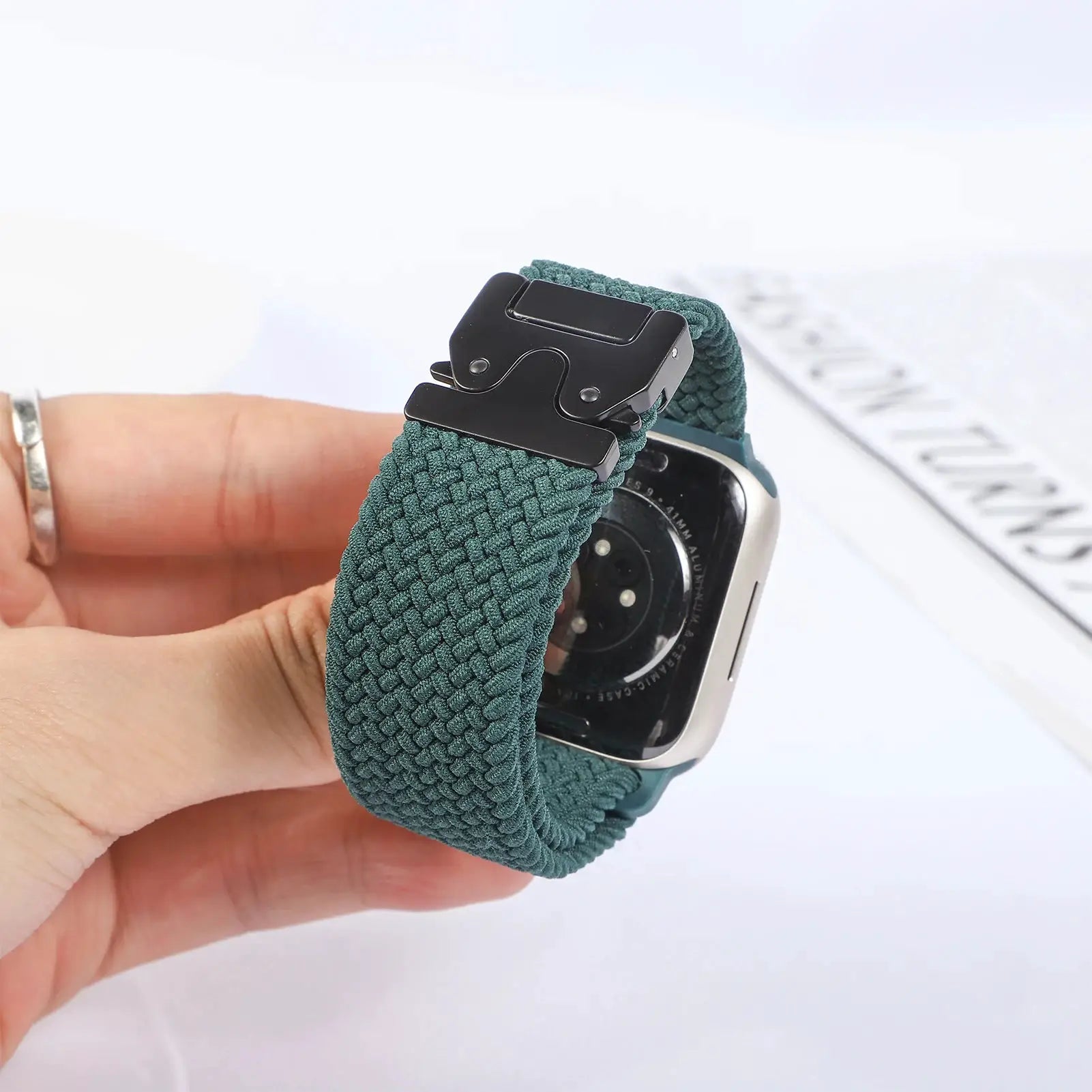 Green braided parachute strap for Apple Watch 41–46mm with black metal clasp