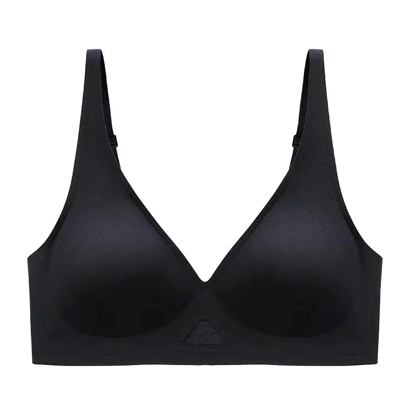 Women's seamless push-up bralette in black with padded cups and mesh panel.