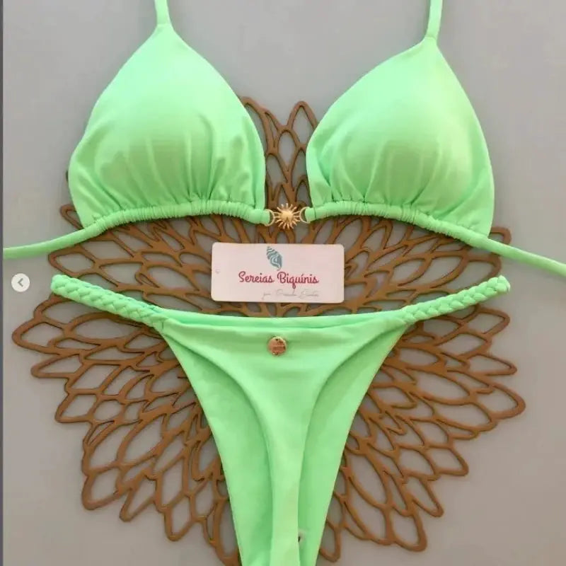 Sereias Biquinis lime-green halter bikini set with braided side straps and thong bottom, gold charm on front.