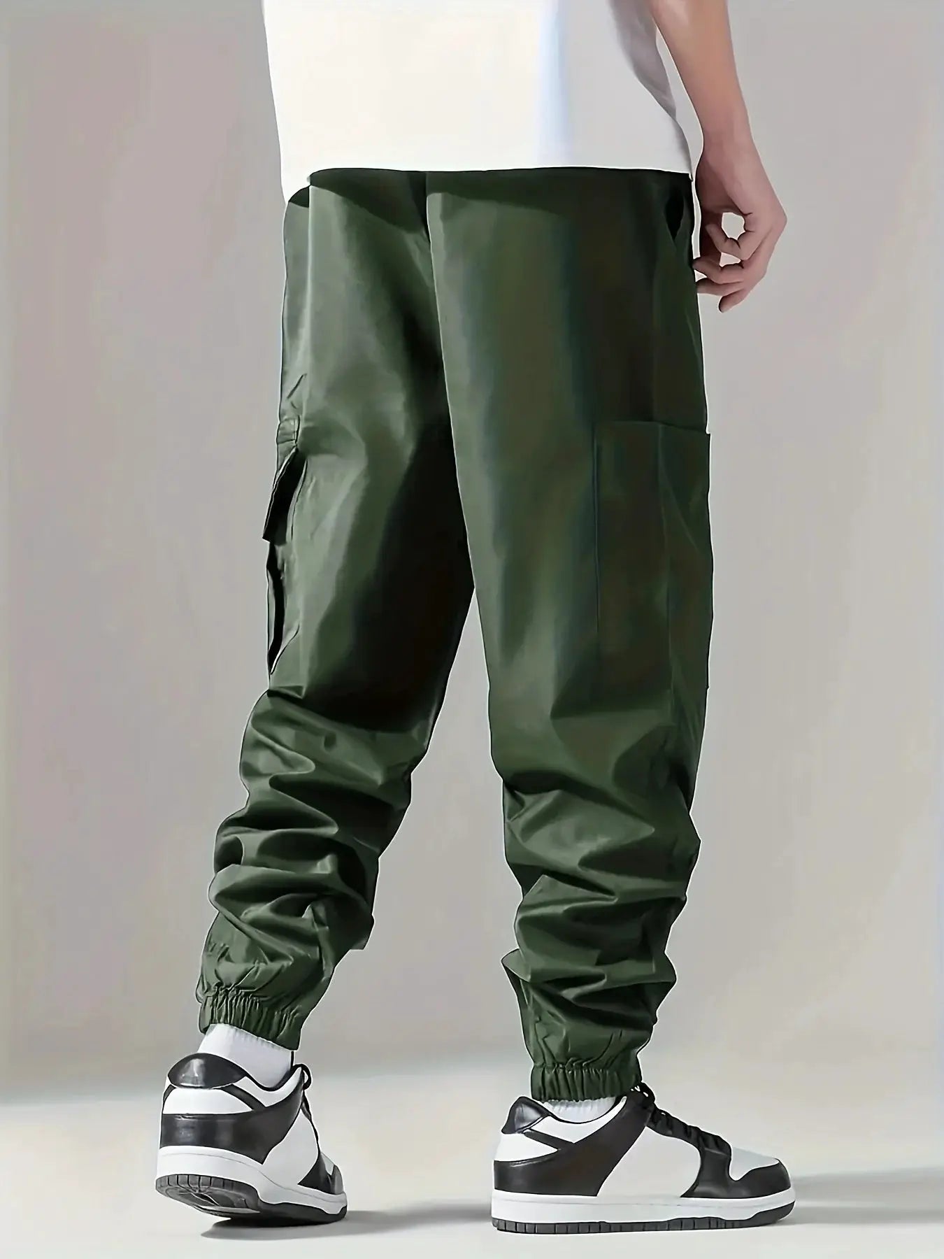 Men's cargo pants, olive green, lightweight and breathable with multiple pockets.