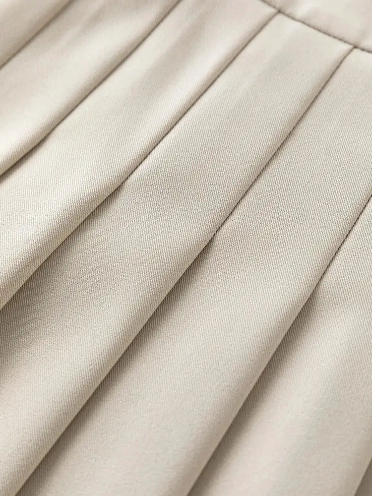 FSLE Women Blazer beige fabric close-up with pleats